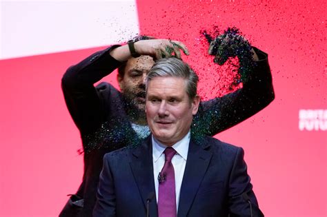 Keir Starmer covered in glitter by protestor as he opens Labour conference speech